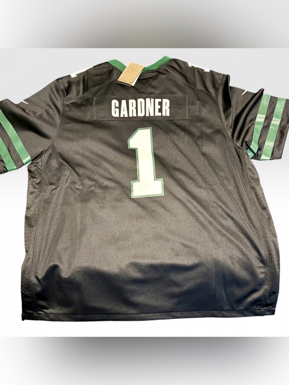 NFL Men’s Black Jersey with Green Trim and White Number 1 - Picture 2 of 3
